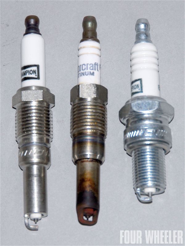 129 1012 The Ford Three Valve Broken Spark Plug Blues champion And Oe Motorcraft Plug Photo 34924107