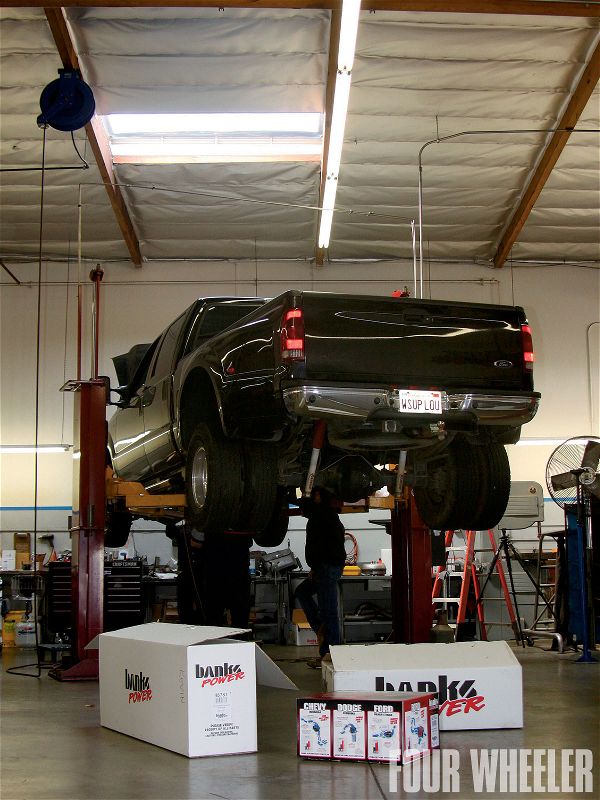 129 1010 Ford Power Stroke Bulletproofing Tactics truck On Lift And Banks Boxes Photo 34359672