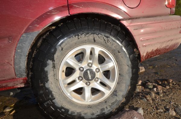 Lifting & Trimming a Junkyard 2004 Isuzu Rodeo to Fit 33s