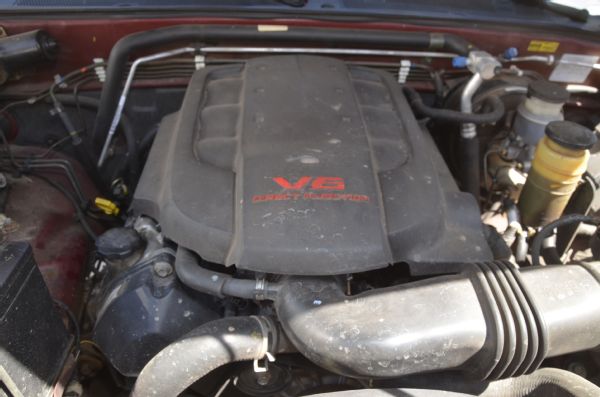 Lifting & Trimming a Junkyard 2004 Isuzu Rodeo to Fit 33s