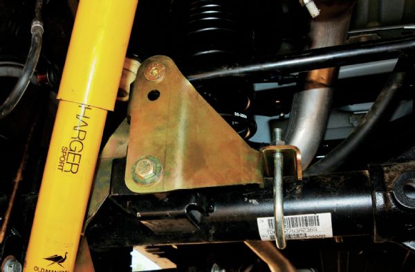 In the rear, a track bar relocation bracket elevates the axle-side mounting point about 3 inches. The bracket was designed to correctly locate the rear axle and not cause any track bar interference with the frame.