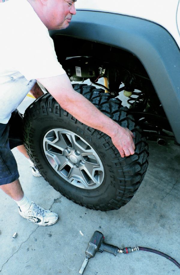 The set of 315/70R17 Mickey Thompson Baja MTZs we mounted up to the stock wheels had a similar tread design to the tire Jeep decided to outfit the Rubicon with. It was just bigger and with a little more puncture-resistant sidewall. The $60 tire-mounting cost would have been within our budget had we not bought wheel spacers and instead just let the tires rub the control arms at full steering lock. Sue us for doing things the right way.