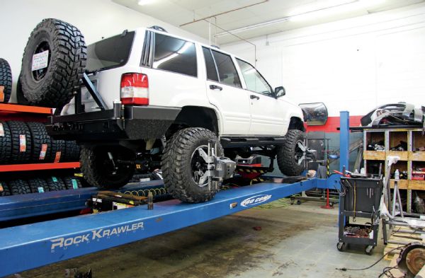 While on the lift, we learned that our ZJ’s wheelbase was off about an inch on one side. Thankfully, this was an easy adjustment, and we were able to get the Jeep tracking straight with a few turns of the control arms. The new setup is a complete turnaround from where it was before. The steering feels tight and solid, and there’s no longer an obnoxious wobble.