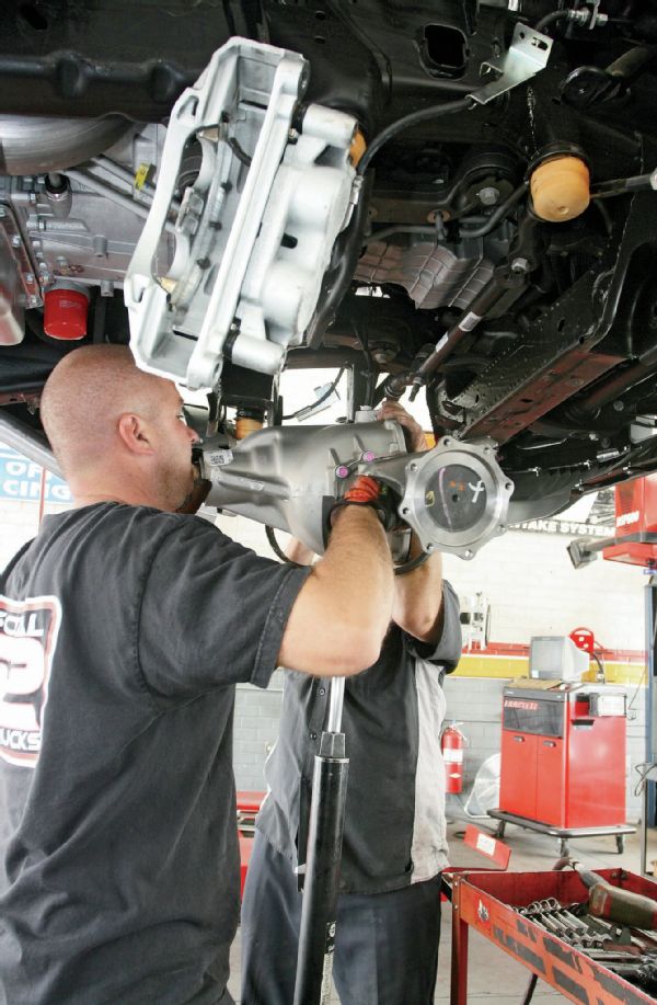 With a heavy-duty jack in place, the differential is lowered down out of the way.