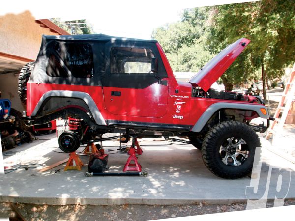 154 1011 Long Arm Lowering Kit jeep Wrangler Tj Side Shot On Jack Stands Photo 29262026