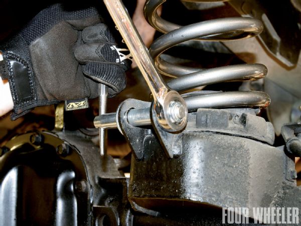 To install the new sway bar quick disconnects, the supplied pins and crush sleeves are installed on each side of the axle. These are the lower mounts for the links.