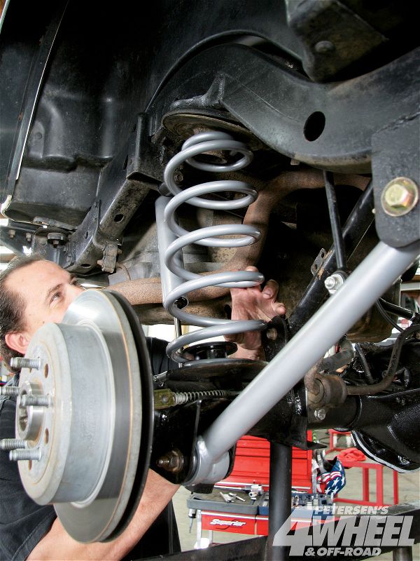 To get the Wrangler in the air, new 3.5-inch coils were installed at all four corners. For ride control and damping we teamed each coil with a Rubicon Express monotube shock.