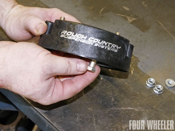 Installing the spacers is as easy as feeding three 2-inch bolts into each spacer from the bottom. There are hex counter-bores integrated into the spacers for each bolt, and this helps to ensure that each bolt is in the exact location they need to be for reassembly.