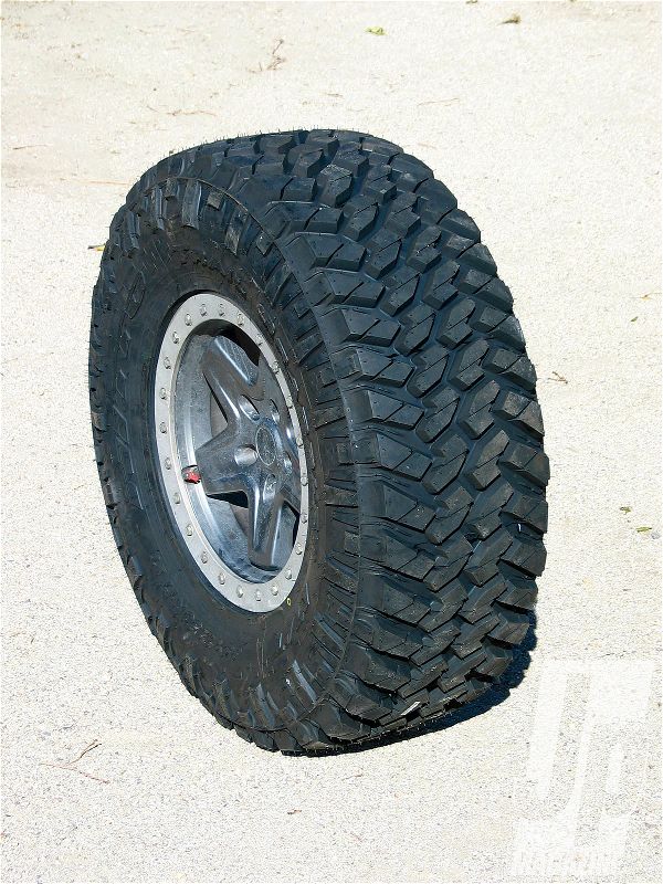 154 1104 Nitto Trail Grappler Mud Terrain Tires side Tread Shot Photo 35884374