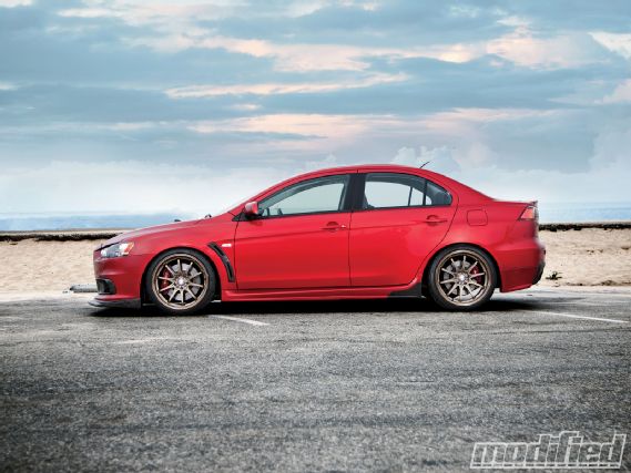 Modp_1011_02_o+2008_mitsubishi_lancer_evolution_x_gsr+driver_side_view