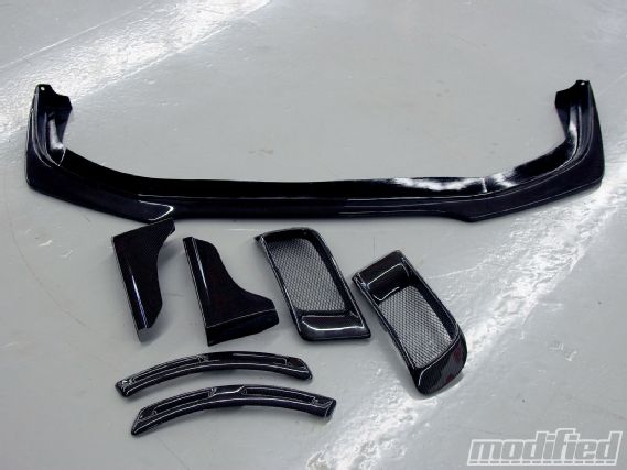 Modp_1011_10_o+2008_mitsubishi_lancer_evolution_x_gsr+carbon_fiber_pieces