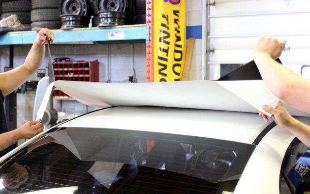 Acura CSX type S CarBox Industries placing roof vinyl 09.JPG