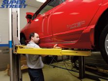 130_0709_21_z+2007_honda_civic_si_sedan+side_under_spoiler_installation