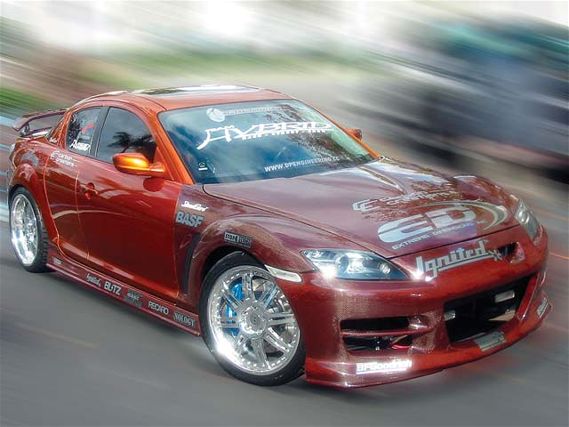 0509tur_10z+mazda_rx8+right_front_view