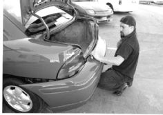 P25622_large+Dodge_Neon+Side_View_Trunk