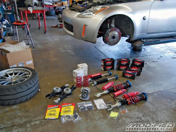 Modp_0909_04_o+project_350z_suspension_install+eibach_springs_set