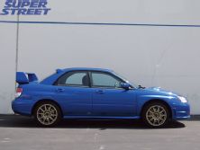 130_0710_03_z+2007_subaru_impreza_sti+side_view