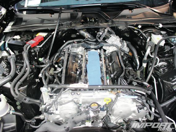 Impp 1204 07 o+stillen vq37 supercharger system+engine bay