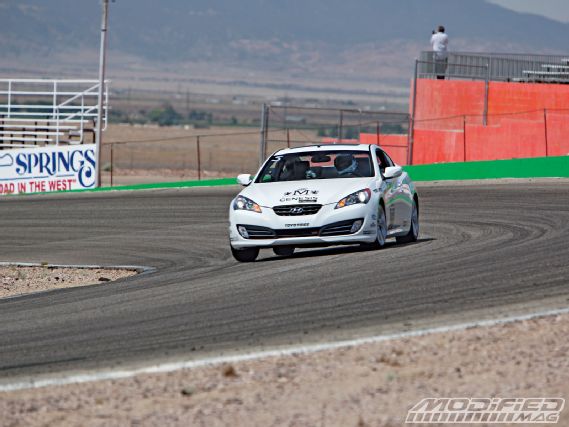 Modp_0909_05_o+2009_hyundai_genesis_coupe_gt+on_track