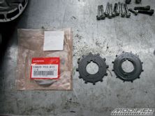 Modp_0904_10_o+honda_s2000_hondata_install+old_vs_new_trigger_wheel