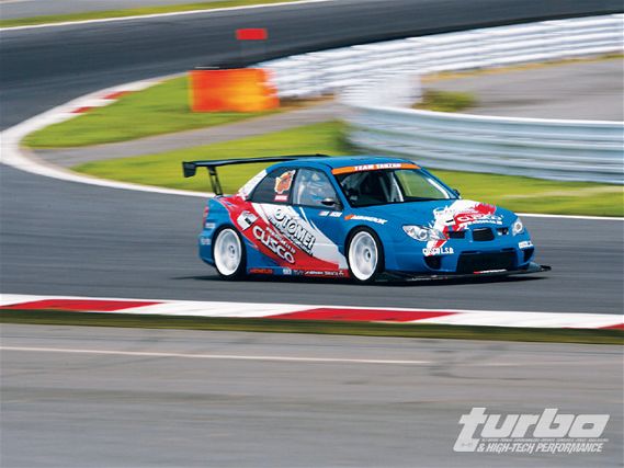 Turp_0901_104_z+subaru_impreza_wrx+cornering