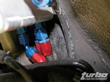 Turp_0812_14_z+mitsubishi_evo_ams_fuel_surge_tank+45_degree_an_fitting