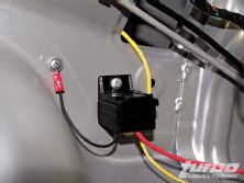 Turp_0812_24_z+mitsubishi_evo_ams_fuel_surge_tank+mounted_painless_relay