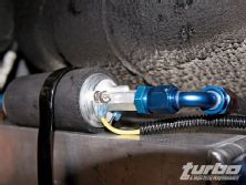 Turp_0812_21_z+mitsubishi_evo_ams_fuel_surge_tank+yellow_wires_connected