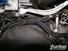 Turp_0812_22_z+mitsubishi_evo_ams_fuel_surge_tank+zip_tied_lines