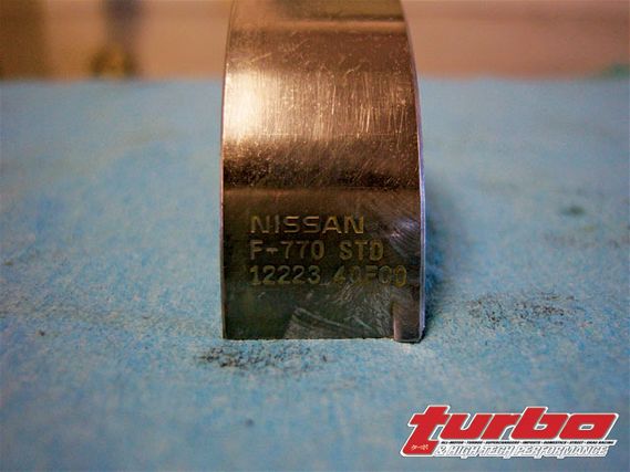 Turp_0811_03_z+nissan_240sx_ka24det_block_buildup+factory_bearing