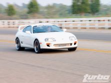 Turp_0501_03_o+1995_toyota_supra+front_right_drive_by