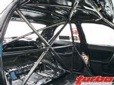 0609turp_23z+2003_subaru_wrx_roll_cage+rear_view