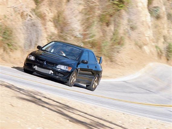 0501tur_06z+project_mitsubishi_lancer_evolution_viii+left_front_view