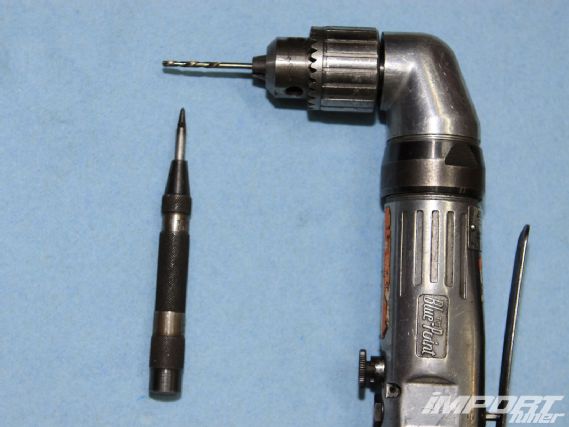 Impp 1109 02 o+broken stud extraction+center punch and drill