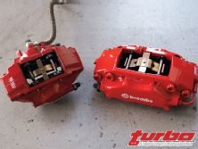 Turp_0808_06_z+mitsubishi_evolution_ix+rear_four_piston_brembo_caliper_vs_stock