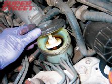 130_0704_06_z+brake_pad_installation_guide+remove_brake_fluid_reservoir_cap