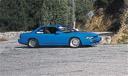 P55319_large+Nissan_240SX+Turning_Passenger_Side_View