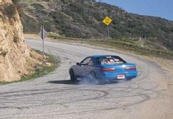 P55338_large+Nissan_240SX+Turning_Driver_Side_Rear_View