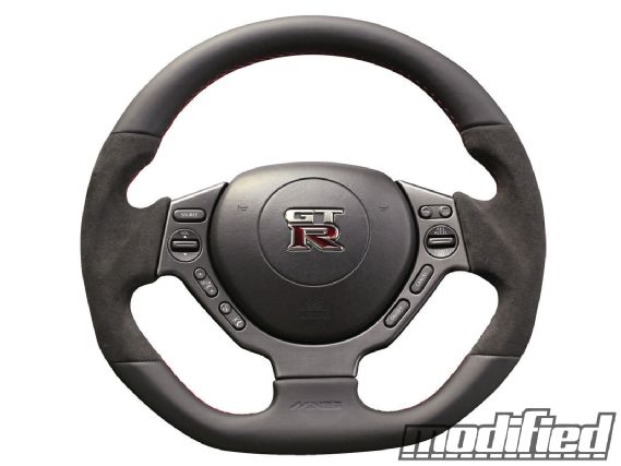 Modp 1304 01 o+racing gear and interior buyers guide+mines nissan GTR steering wheel