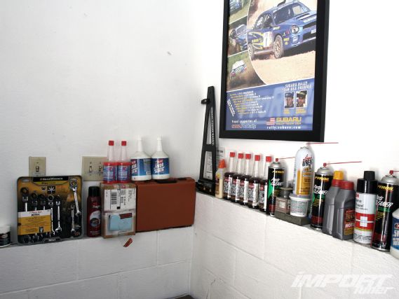 Impp 1209 03 o+andys autosport shelves+garage clutter