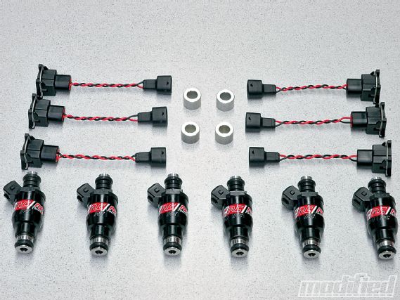 Modp_1003_09_o+march_2010_mod_gear+RC_engineering_racing_fuel_injectors